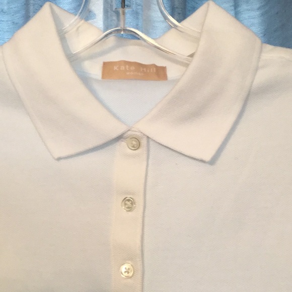 White sleeveless “polo” style shirt. - Picture 2 of 3